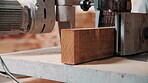 Closeup, machine and carpentry with wood for sanding in workshop, smooth timber and furniture manufacturing. Industrial sander, tools or equipment with lumber in factory, woodworking and production