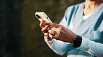 Outdoor, woman and hands of nurse with phone for texting, communication or telehealth on mobile app. Space, typing and medical caregiver with cellphone for online healthcare review with email.
