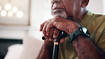 Hands, senior man and thinking with cane for Arthritis, elderly care or wellness in home. Pensioner, person with a disability and walking stick for injury, reflection and rehabilitation in retirement