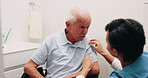 Dressing, caregiver or old man in bathroom with wheelchair, grooming help or elderly care in nursing home. Nurse, patient or senior person with disability, getting ready or support in assisted living