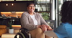 Home, wheelchair and old woman holding hands with caregiver, smile or discussion for stroke recovery. Happy, nurse and senior person with disability, feedback and medical support for rehabilitation.