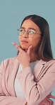Thinking, business or woman with issue, brainstorming or idea generation for job solution. Mindset, glasses or employee with confusion, strategy planning or problem solving on studio background.