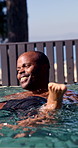 Swimming, pool and father with son for learning, aquatic skills and playful development or exercise. Black family, help and dad with child for water sports, health and wellness together outdoors