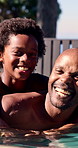 Swimming pool, face and father with son for learning, aquatic skills and development or exercise. Black family, portrait and dad with child for water sports, smile and wellness together outdoors