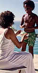 Swimming, mother and child by pool for grapes snack, hungry or healthy vitamins for energy. Holiday break, african family and happy with nutrition at resort for fruit, wellness and relax together