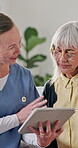 Nurse, old woman and tablet for healthcare with consulting, feedback or review in retirement home. App, medical results and report with caregiver speaking to senior patient for checkup or visit