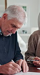 Elderly couple, document and sign contract in home for agreement, sale or property disclosure. Retirement, man and signature on form for legal compliance, real estate purchase and deal with realtor