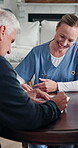 Documents, medical and signature of old couple with nurse for insurance or sign up. Clipboard, healthcare and paperwork with caregiver speaking to senior people for advice, approval or consulting
