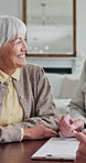 Document, signature and senior woman with smile in house, talking and meeting with financial advisor. Elderly couple, writing and approval for insurance policy, explain and happy people with contract