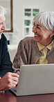 Finance, laptop and senior couple in home together for online budget or retirement planning. Computer, financial review and laughing with old people in apartment for investment or wealth management