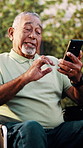 Senior, man and happy with video call in wheelchair with wave, recovery update or online connection. Laugh, person with disability or virtual chat outdoor for healing progress, catch up or retirement