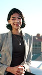Face, business and woman on balcony with smile, career pride and about us for real estate. Portrait, female person and realtor on terrace with ambition, urban housing and infrastructure development