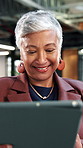 Laugh, office and mature woman with tablet for economy news, investment update or reading email. Technology, happy consultant and person at work for enterprise asset, financial equity or funny joke