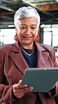 Smile, office and mature woman with tablet for economy news, investment update or reading email. Technology, happy consultant and person in workplace for enterprise asset, financial equity or review