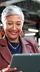 Office, funny and mature woman with tablet for economy news, investment update or reading email. Technology, happy consultant and person at work for enterprise asset, financial equity or laugh