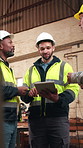 People, talking and tablet in workshop for carpentry, research and timber inventory for production. Team, carpenter and discussion in warehouse with digital, lumber order and manufacturing furniture