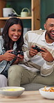 Happy, weekend and couple on sofa for video games, online competition and playing together for bonding. Home, dating and man with woman with controller for entertainment, virtual challenge and fun