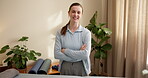 Arms crossed, face and woman in physical therapy office, career pride or healthcare with smile. Happy, confident and professional physiotherapist in portrait, ambition and medical service at practice