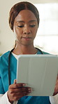 Nurse, healthcare and black woman with tablet for schedule, planning or medical research in home. Health worker, female person or caregiver with technology for Telehealth, ideas or routine in house