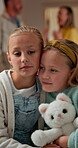 Fight, parents and kids in house with support, sibling comfort and marriage conflict in toxic relationship. Sad, hug and girls with plush toy, emotional security and protection from family dispute.