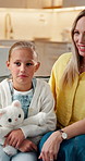 Smile, mother and child at house for counseling, consultation and guidance for psychology. Happy, woman and daughter with teddy bear for home visit, therapy session and advice of behavior assessment 