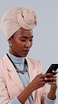 Angry, typing and woman with phone in studio for mistake, bad news and error for online project. Business, frustrated and African person on cellphone for email, scam and phishing on white background