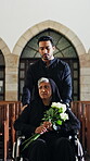 Family, church and sad woman in wheelchair with flowers for memorial service, widow or ceremony. Funeral, man or senior person with disability in chapel for christian religion, mourn or bereavement