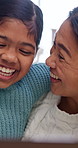 Laugh, home and mom with child for watching movies, comedy or streaming on laptop on weekend. Family, happy and girl with mother on tech for series, cartoons or funny film for bonding, relax and love