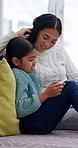 Happy, tablet and child with mom on sofa for streaming, watching videos and relax with entertainment. Weekend, home and mother with girl on digital tech for educational games, internet and bonding 