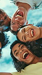 Face, huddle and laughing with friends outdoor from below for bonding, humor or solidarity. Community, funny and sky with group of happy people in circle together for support, trust or unity