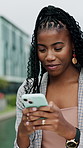 Business, text and black woman in city with phone, message response and networking on chat app. Happy, contact and businesswoman outdoor with tech, digital communication and email feedback in town.