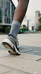 Fitness, pace and legs in town with running, cardio and stamina training in physical activity. Sports, man and athlete outdoor with jogging, wellness hobby or workout endurance in Los Angeles.