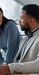 Call center, manager or man in office with headset, customer inquiry or advice in crm discussion. Review, director or agent with mic, performance feedback or help desk guidance with issue response.