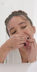 Mirror, woman and floss teeth in bathroom for dental hygiene, morning routine or gingivitis prevention. Person, smile and check mouth in home with reflection, string or plaque removal for oral health
