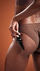 Hands, underwear and butt of woman with sex toy for self pleasure, passion and personal intimacy. Sensual, body and person with accessory for education, wellness and stimulation on studio background