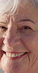 Holiday, face and old woman outdoor with smile, positive attitude and upbeat on summer trip. Portrait, closeup and senior person with happy moment, good mood and satisfaction on retirement vacation.