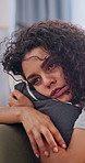 Fatigue, thinking and woman with depression on sofa in home living room for heartbreak or loss. Grief, memories and psychology with unhappy person in apartment for regret, mistake or perspective