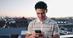 Phone, typing and man in city at night for online communication, text and update with bokeh. Mobile, smile and person outdoor for internet post, notification and social media message with contact