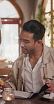 Menu, waiter and customer with order in restaurant for food option, service or choice on weekend. Happy, question and person in cafe for diner selection, decision or breakfast request on holiday.