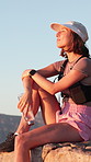 Hiking, sightseeing and woman on mountain for adventure, travel or fitness with exercise. Happy, journey and female person trekking with outdoor scenery for workout, challenge or active in nature.
