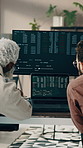 Coding, review or team in office with computer screen, bug fix or feedback on data platform. Men, back or system engineers with technology, framework testing or collaboration in software programming.