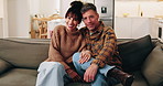 Face, couple and relax in home with smile, love and support for bonding together in lounge. Portrait, mature people and rest on couch with embrace, partner affection and comfortable for weekend break