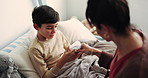 Mother, bedroom and sick child with tissue for blowing nose, flu or sinus problem and help in family home. Girl kid, ill son and woman with support for allergies, recovery or healing in house