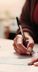 Woman, hands or signing with documents in home for financial contract, investment or legal agreement. Female person, writing or signature with application, form or paper for finance or asset in house