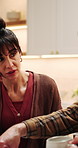 Frustrated, stress and woman with argument in home for spending dispute, financial crisis or upset. Marriage conflict, debt issue and mature people with disagreement for bankruptcy or bills in house