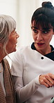 Senior woman, listen and caregiver with tablet in house, consultation and explain medical diagnosis. Retirement, home and nurse with tech, talking and healthcare information on web for elderly person