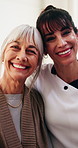 Face, caregiver and hug with old woman for homecare, health support and happiness with assisted living. People, retirement and embrace carer with smile, wellness and medical service with trust