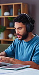 Laptop, headphones and man in home office with music, financial advice and freelancer. Remote work, account manager and person with digital tech for podcast, typing feedback and portfolio analysis