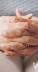 Nervous, hands and person with anxiety in therapy for trauma counseling, mental health and PTSD. Woman, psychology patient and fidgeting with stress, overwhelmed and stimming for coping mechanism