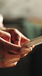 Hands, typing and renovation in house with phone, ecommerce website and planning for diy makeover. Person, browsing and home improvement with tech, remodeling project and online shopping for paint.